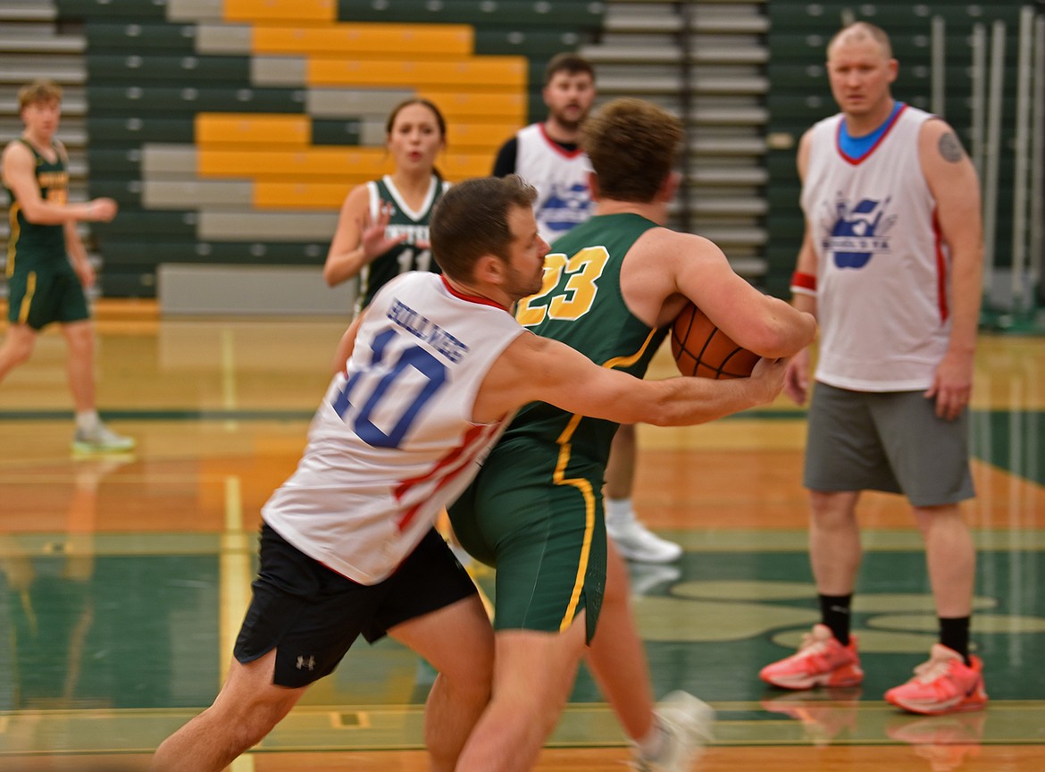 Whitefish High School basketball players played against a squad of police officers and high school teachers for the Mega Bowl fundraiser on Friday. (Kelsey Evans/Whitefish Pilot)