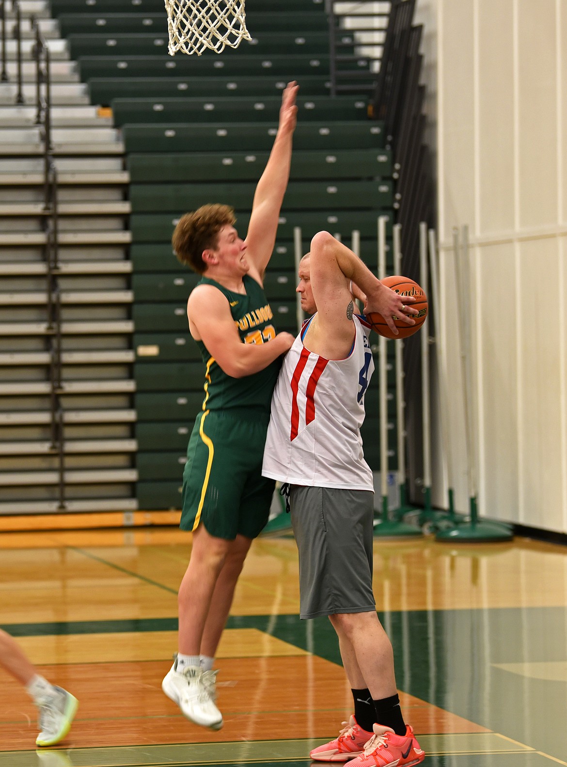 Whitefish High School basketball players played against a squad of police officers and high school teachers for the Mega Bowl fundraiser on Friday. (Kelsey Evans/Whitefish Pilot)