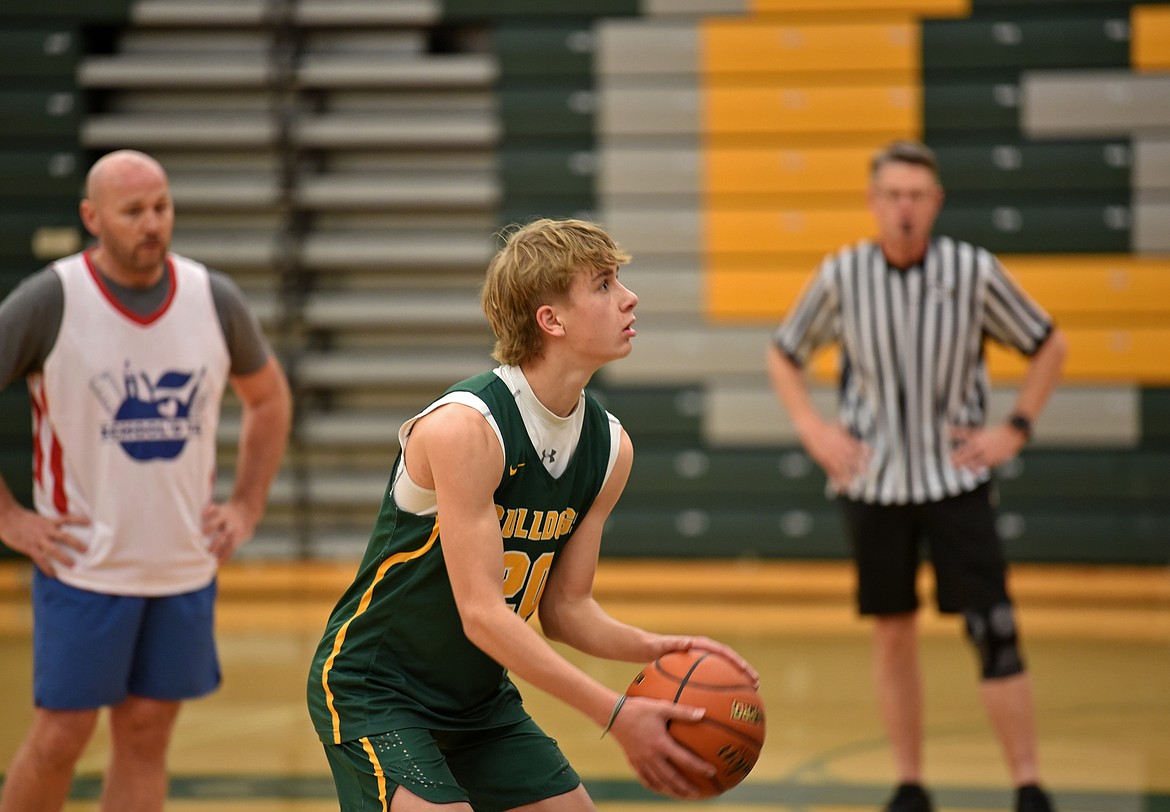 Whitefish High School basketball players played against a squad of police officers and high school teachers for the Mega Bowl fundraiser on Friday. (Kelsey Evans/Whitefish Pilot