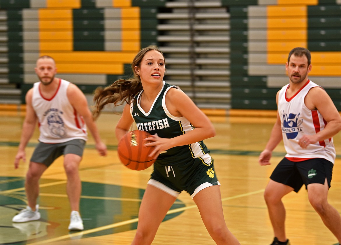 Whitefish High School basketball players played against a squad of police officers and high school teachers for the Mega Bowl fundraiser on Friday. (Kelsey Evans/Whitefish Pilot