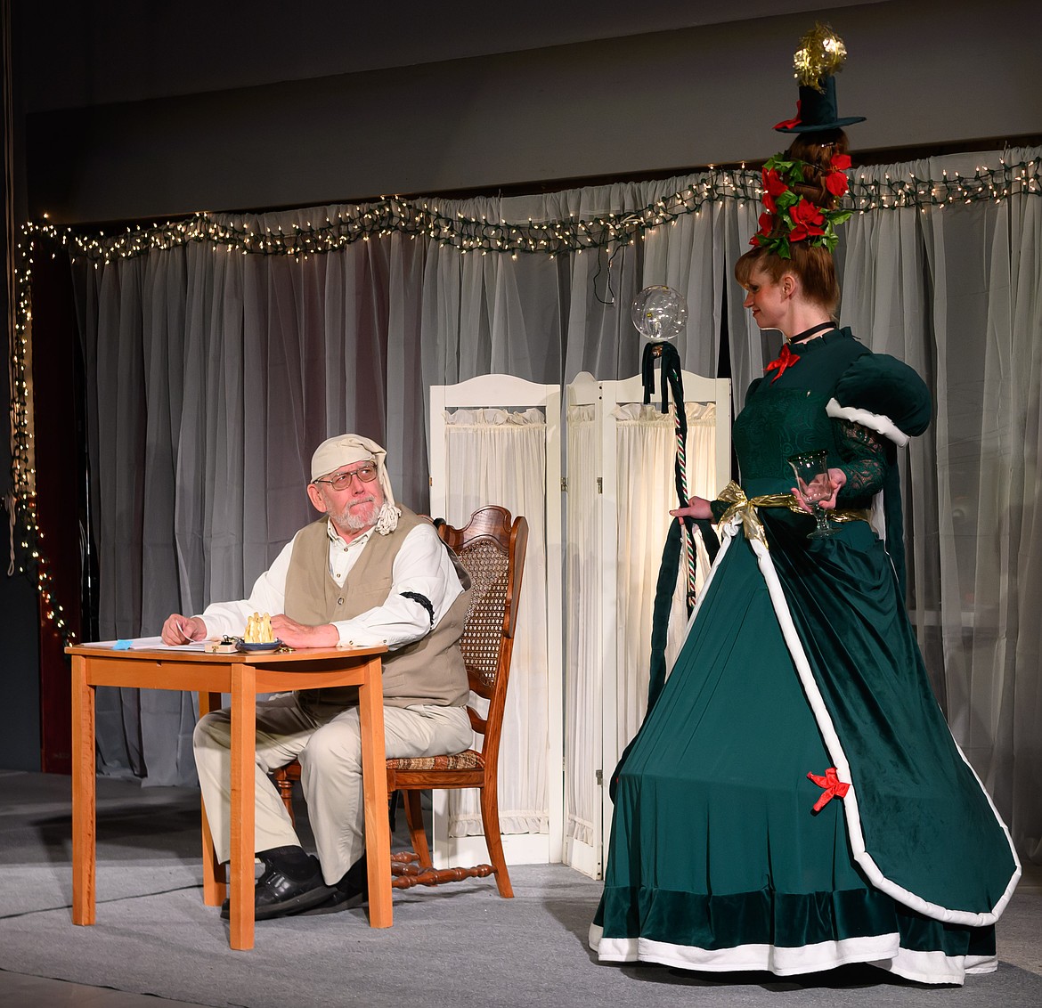 Butch Murdock as Scrooge with Ghost of Christmas Present played by Rashell Jones. (Tracy Scott/Valley Press)