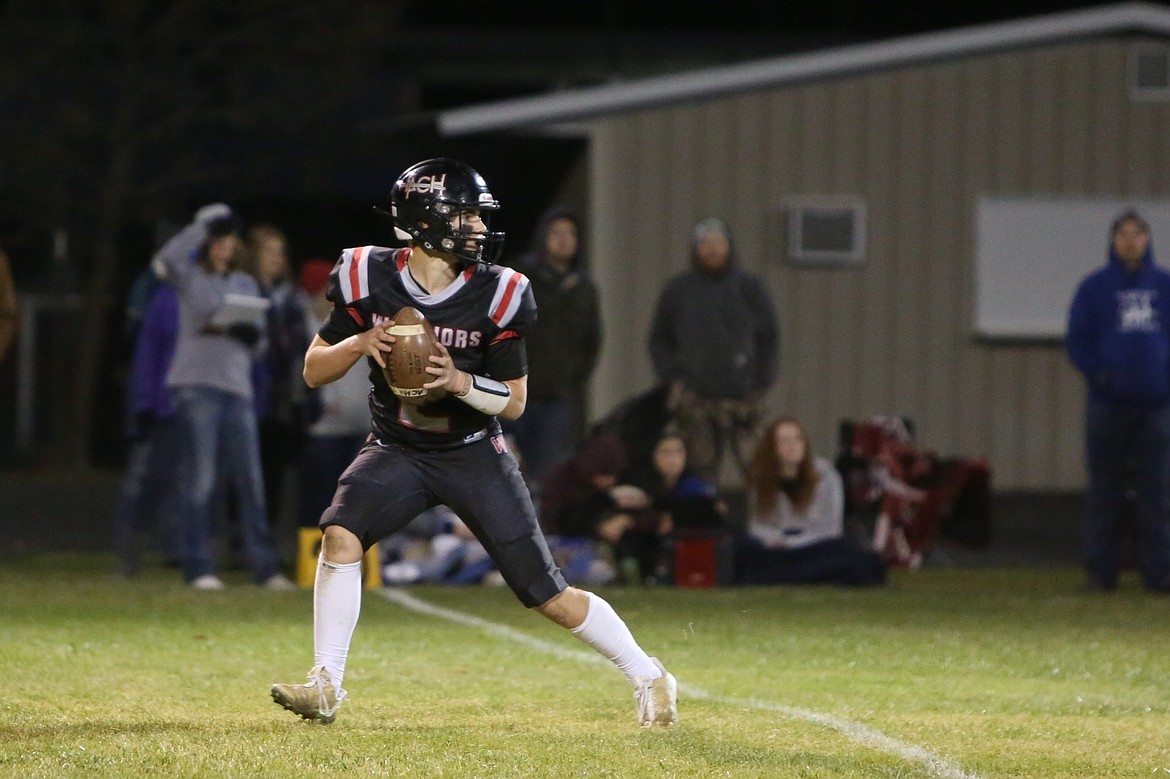 Almira/Coulee-Hartline junior Caden Correia drops back to pass against Wilbur-Creston-Keller.