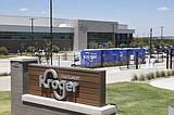 A federal judge temporarily halts the proposed supermarket merger of Kroger and Albertsons
