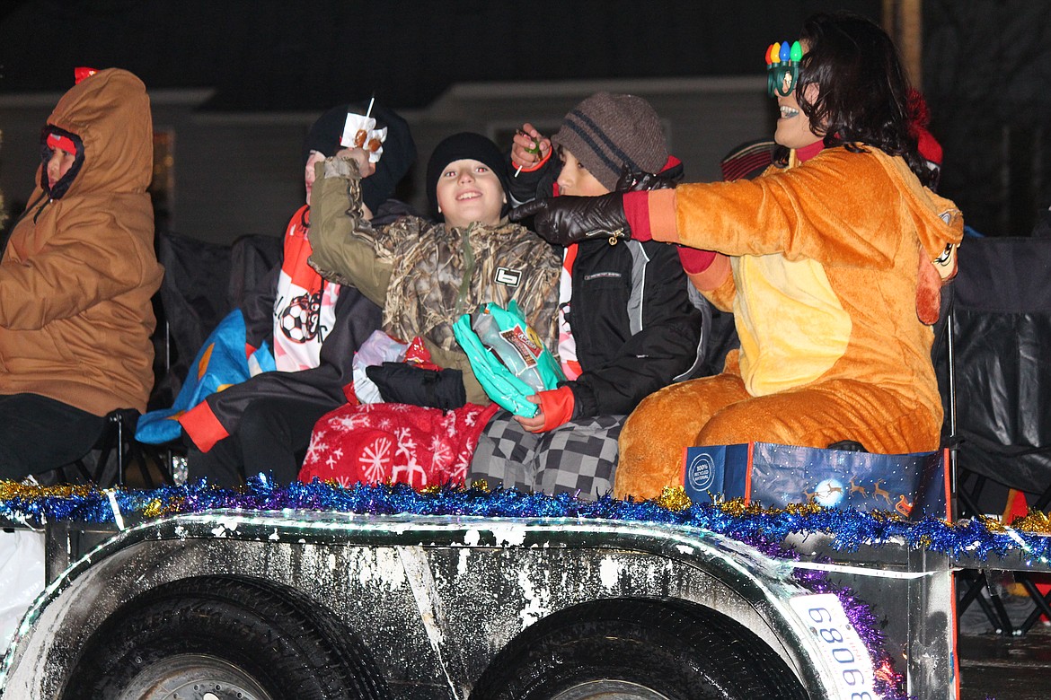 Handfuls of candy flew through the air during the Othello Christmas parade