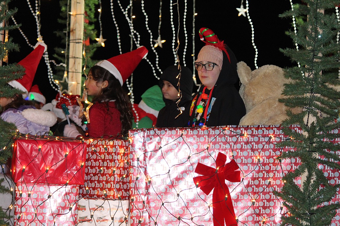 Children dressed in appropriate holiday garb for the Othello Christmas parade.