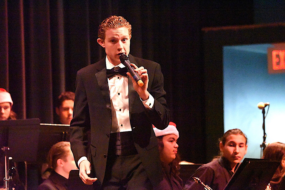 Libby High School band director Patrick Lewis speaks to the crowd during the Dessert Concert Tuesday, Dec. 10, 2024, at the Memorial Center. (Scott Shindledecker/The Western News)