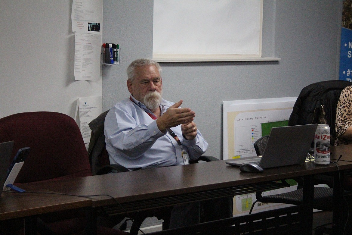 Adams County Commissioner Jay Weise lays out some of the challenges dealing with a homeless encampment near Othello in a meeting Wednesday.