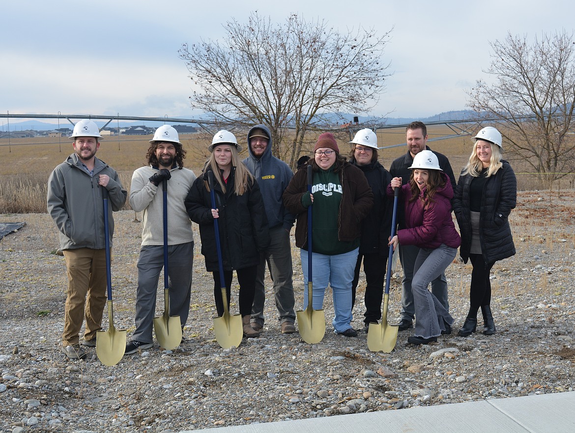 Future homeowners broke ground at the Miracle on Britton with gold-colored shovels Wednesday. The Panhandle Affordable Housing Alliance plans to build 15 homes in 2025 and the remaining 13 homes will start in early 2026. In photo: Garrett Kreitz, Nathan Armon, Melissa Kimp, Colin McIver-Zeckula, Casey Doyle, Daniel Doyle, Sean Salmon, Taytem Wolfe and Desiree Rubley.