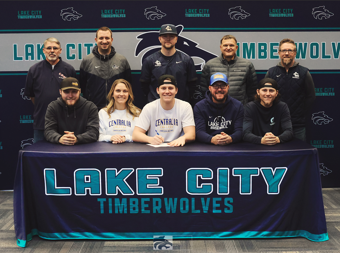 Courtesy photo
Lake City High senior Travis Usdrowski recently signed a letter of intent to play baseball at Centralia (Wash.) Community College. Seated from left are Tristan Usdrowski (brother), Tori Usdrowski (mother), Travis Usdrowski, Dan Usdrowski (father) and Jarrett Usdrowski (brother); and standing from left, Darren Taylor (Coeur d'Alene Lumbermen American Legion coach), Troy Anderson (Lake City High athletic director), Cody Garza (Lake City High assistant coach), Paul Manzardo (former Lake City High head coach) and Mike Criswell (Lake City High head coach).