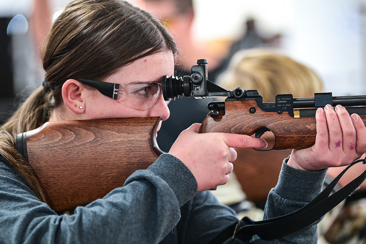 Adelyn Blade looks down the sight during a round of air rifle practice with Flathead 4-H Shooting Sports on Thursday, Dec. 12. (Casey Kreider/Daily Inter Lake)