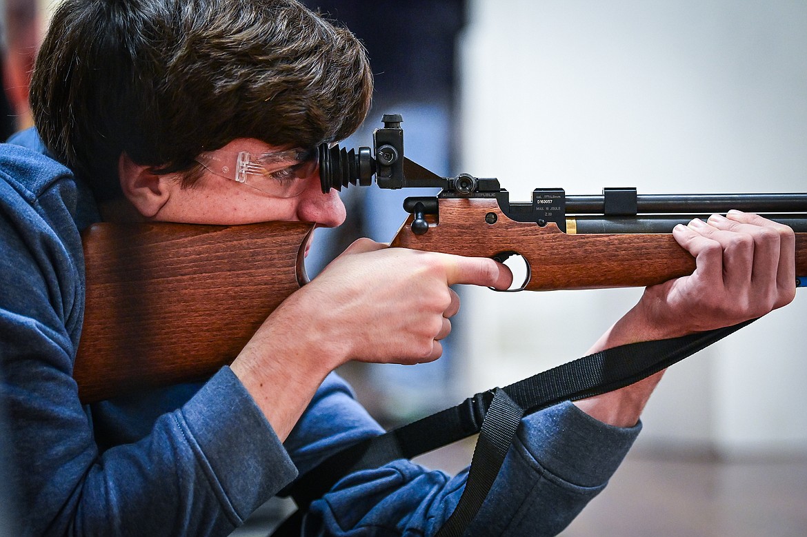 Jubal Clark looks down the sight during a round of air rifle practice with Flathead 4-H Shooting Sports on Thursday, Dec. 12. (Casey Kreider/Daily Inter Lake)