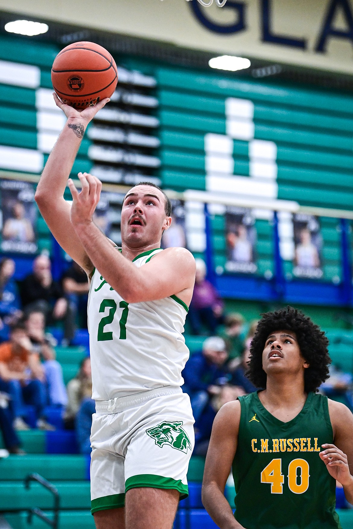 Glacier's Slate Burrington (21) looks to shoot in the first quarter against Great Falls CMR at Glacier High School on Friday, Dec. 13. (Casey Kreider/Daily Inter Lake)