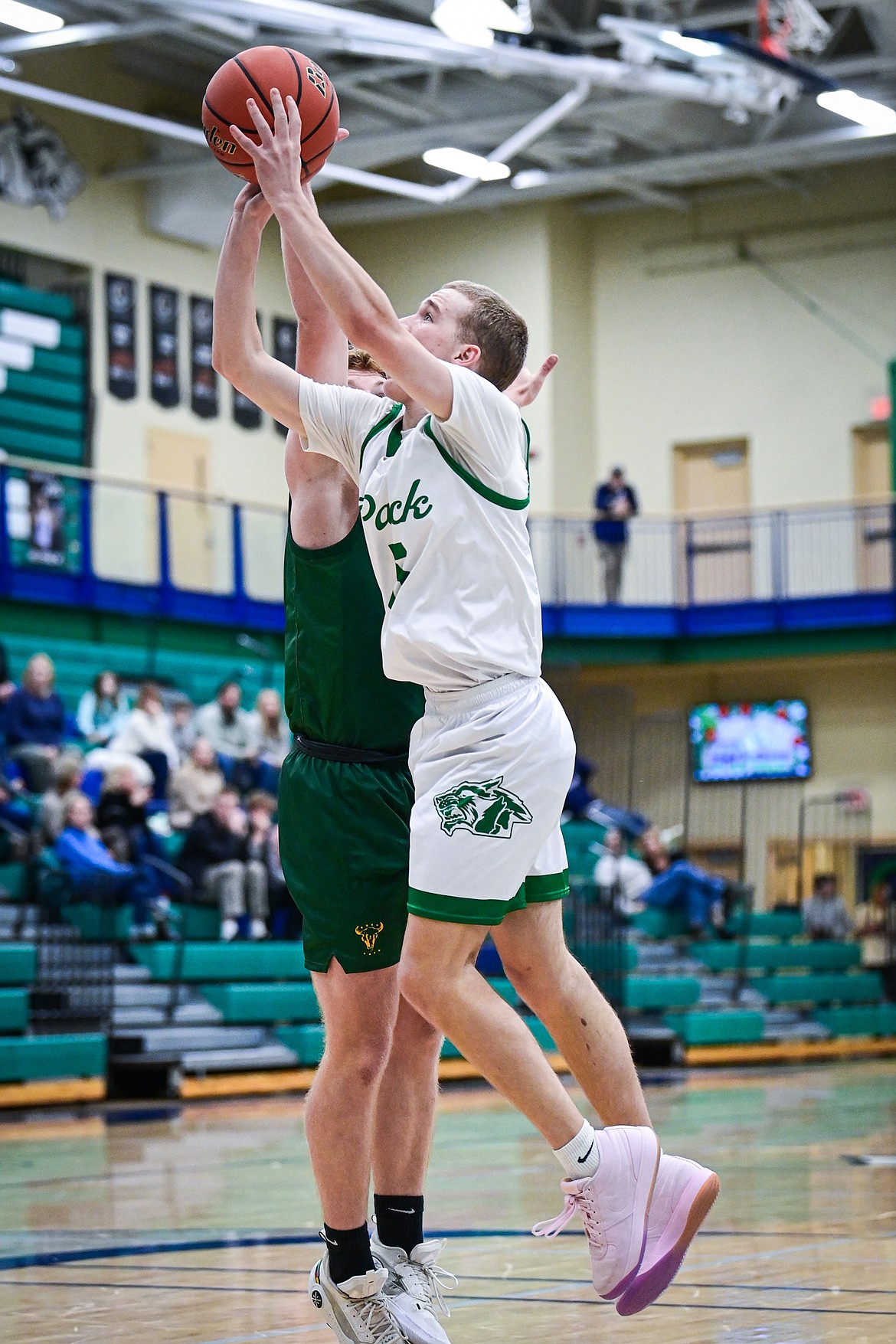 Glacier's Easton Kauffman (5) drives to the basket in the second quarter against Great Falls CMR at Glacier High School on Friday, Dec. 13. (Casey Kreider/Daily Inter Lake)