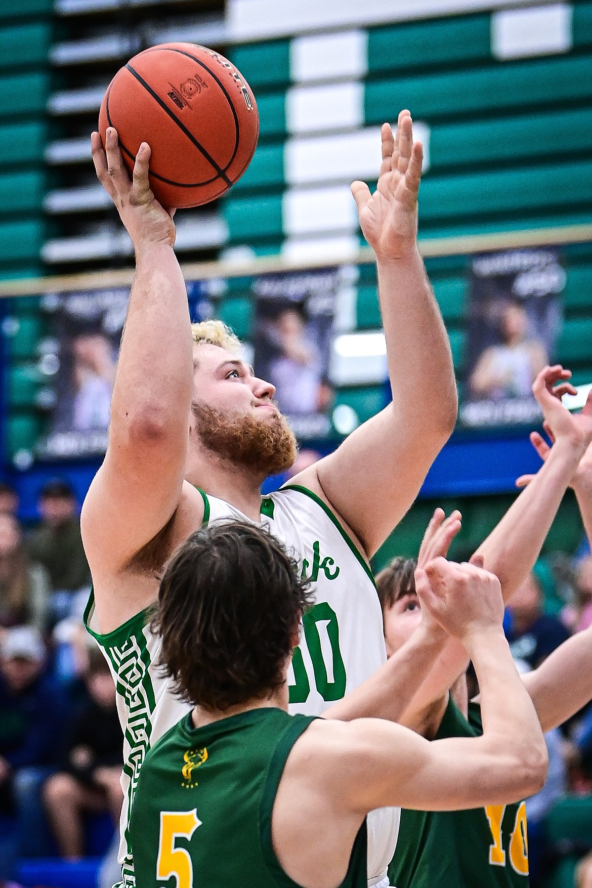 Glacier's Ben Winters (50) knocks down a shot in the paint in the third quarter against Great Falls CMR at Glacier High School on Friday, Dec. 13. (Casey Kreider/Daily Inter Lake)