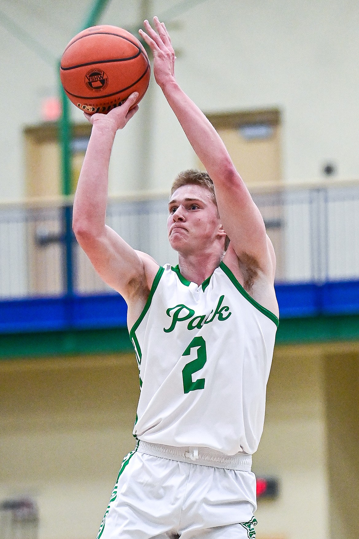 Glacier's Liam Ells (2) knocks down a three in the first quarter against Great Falls CMR at Glacier High School on Friday, Dec. 13. (Casey Kreider/Daily Inter Lake)