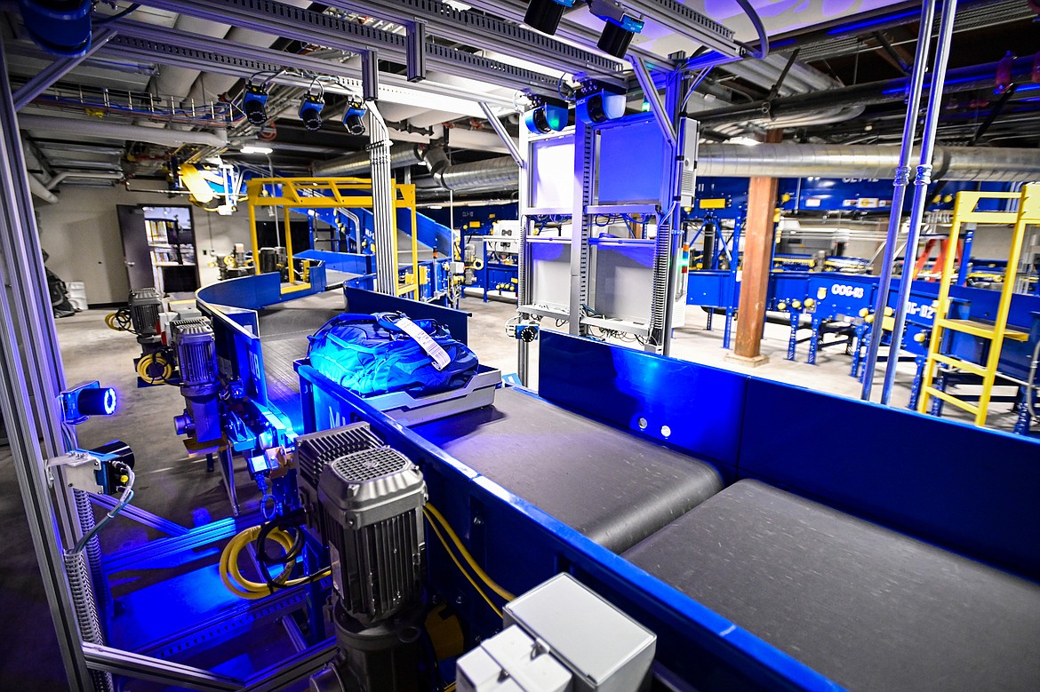 A piece of luggage is scanned inside the automated baggage handlng area at Glacier Park International Airport on Friday, Dec. 13. (Casey Kreider/Daily Inter Lake)