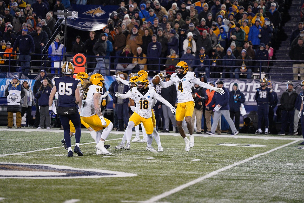 Photo by IDAHO ATHLETICS 
Isiah King (4) of Idaho celebrates a first-quarter interception against Montana State in an FCS quarterfinal game Friday night in Bozeman, Mont.