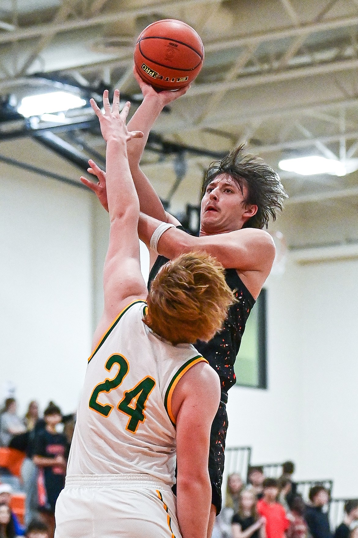 Flathead's Lyric Ersland (13) drives into the paint for a shot in the first quarter against Great Falls CMR inside Gene Boyle Gymnasium at Flathead High School on Saturday, Dec. 14. (Casey Kreider/Daily Inter Lake)