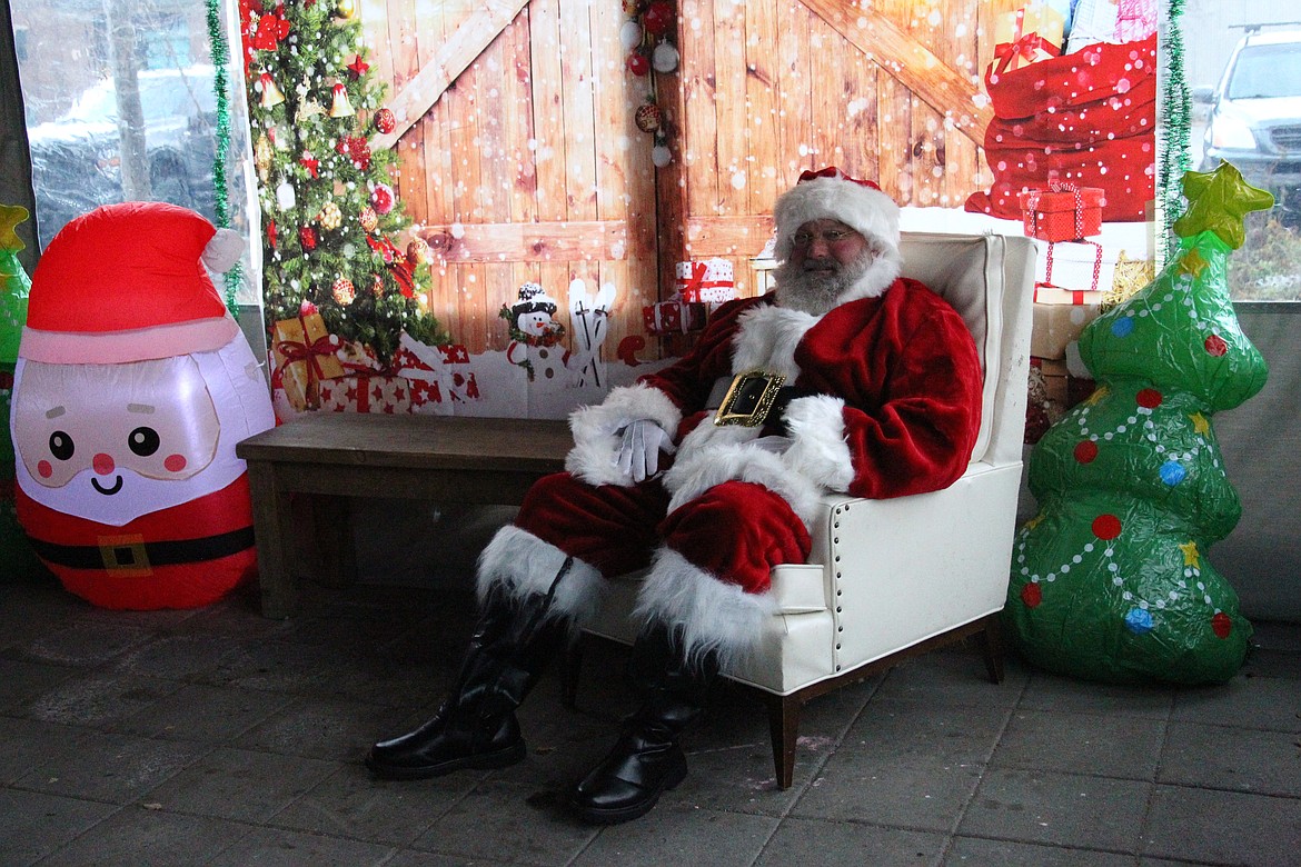 Santa waits for a visitor at the community's first SantaCon event, which kicked off at Matchwood Brewing on Saturday.