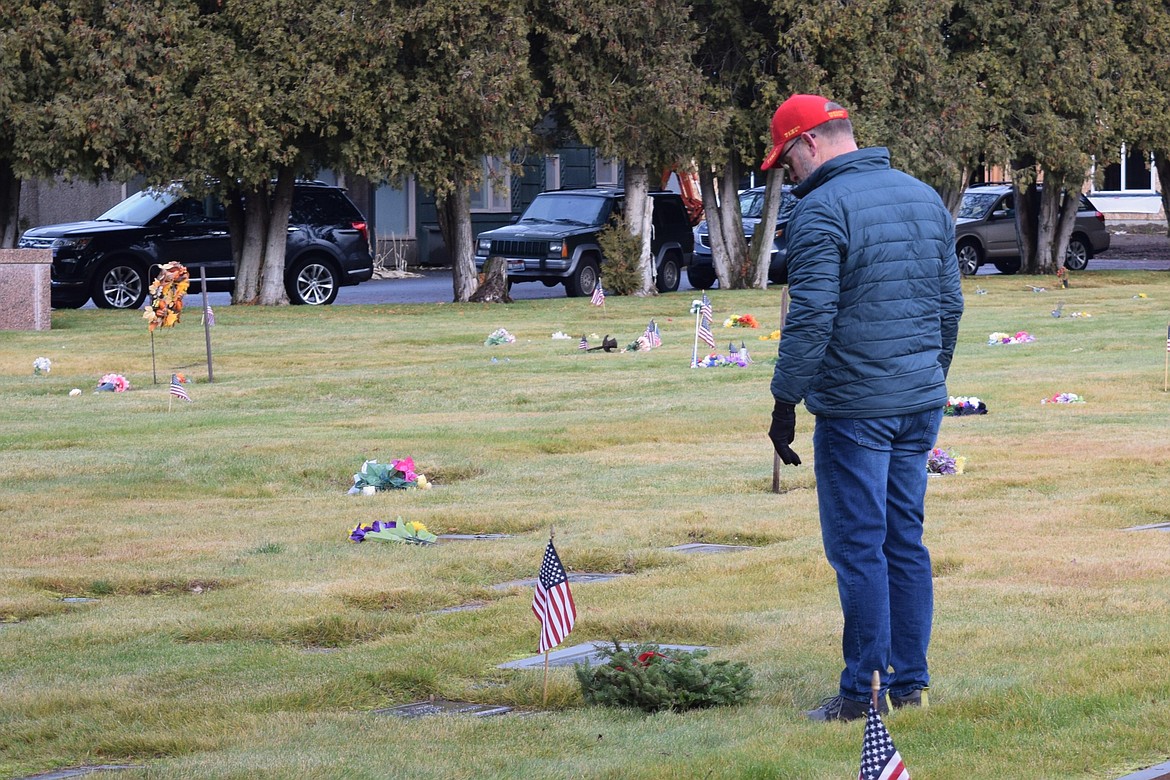 People were encouraged to say the name of the veteran aloud as they laid the wreath at their grave.