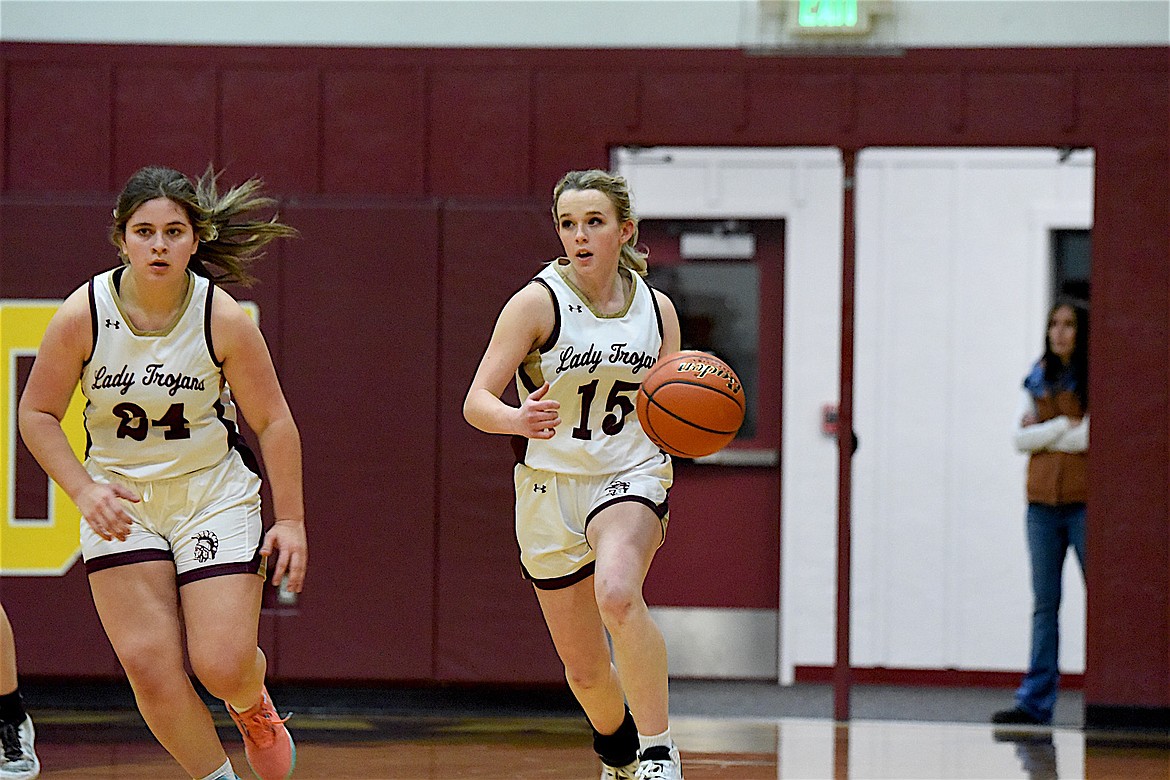 Troy's Kirsti Jellesed looks upcourt against Plains Trotters Saturday, Dec. 14, 2024, at the Troy Activity Center. (Scott Shindledecker/The Western News)