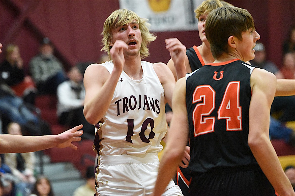 Troy's Kempton Sloan reacts after making a pass against the Plains Horsemen during a 49-33 win, Saturday, Dec. 14, 2024, at the Troy Activity Center. (Scott Shindledecker/The Western News)