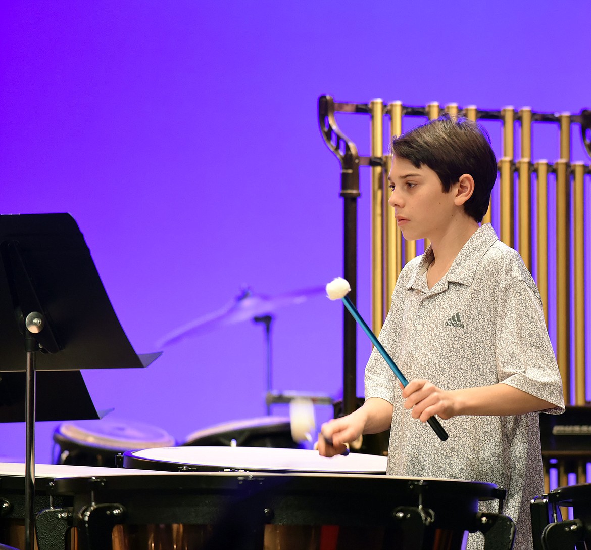 Weston Hunter plays with the eighth-grade band at a concert last week. (Julie Engler/Whitefish Pilot)