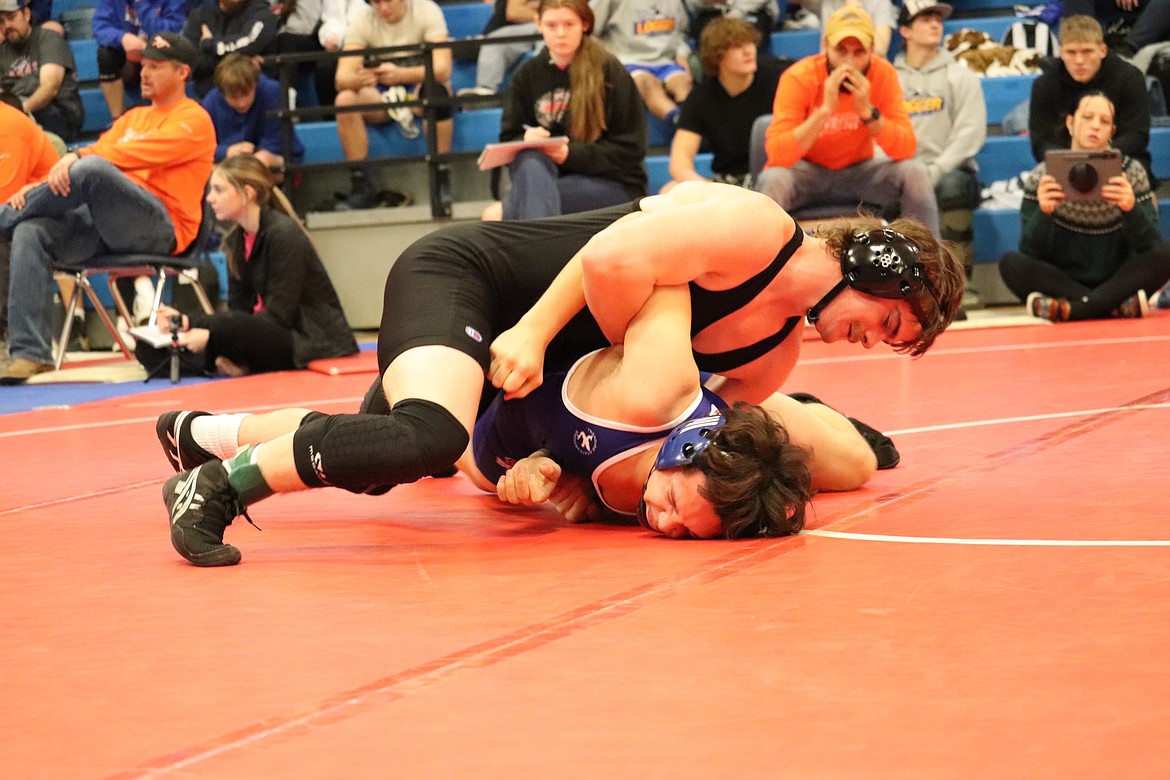 Brock Ryan, Plains-Hot Springs (black), was second in the 150-pound category at this past weekend's Bob Kinney Invitational in Superior.  (Photo by Kami Milender)