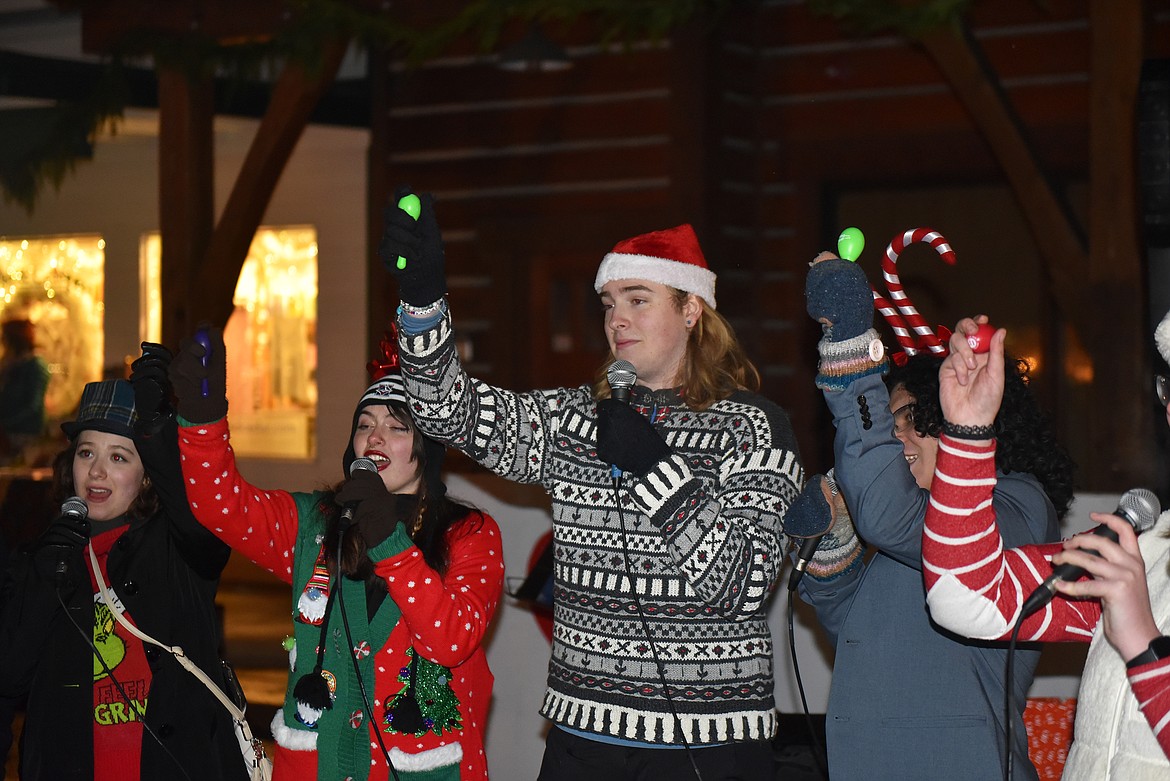 Carolers abound at the Christmas Stroll. (Kelsey Evans/Whitefish Pilot)