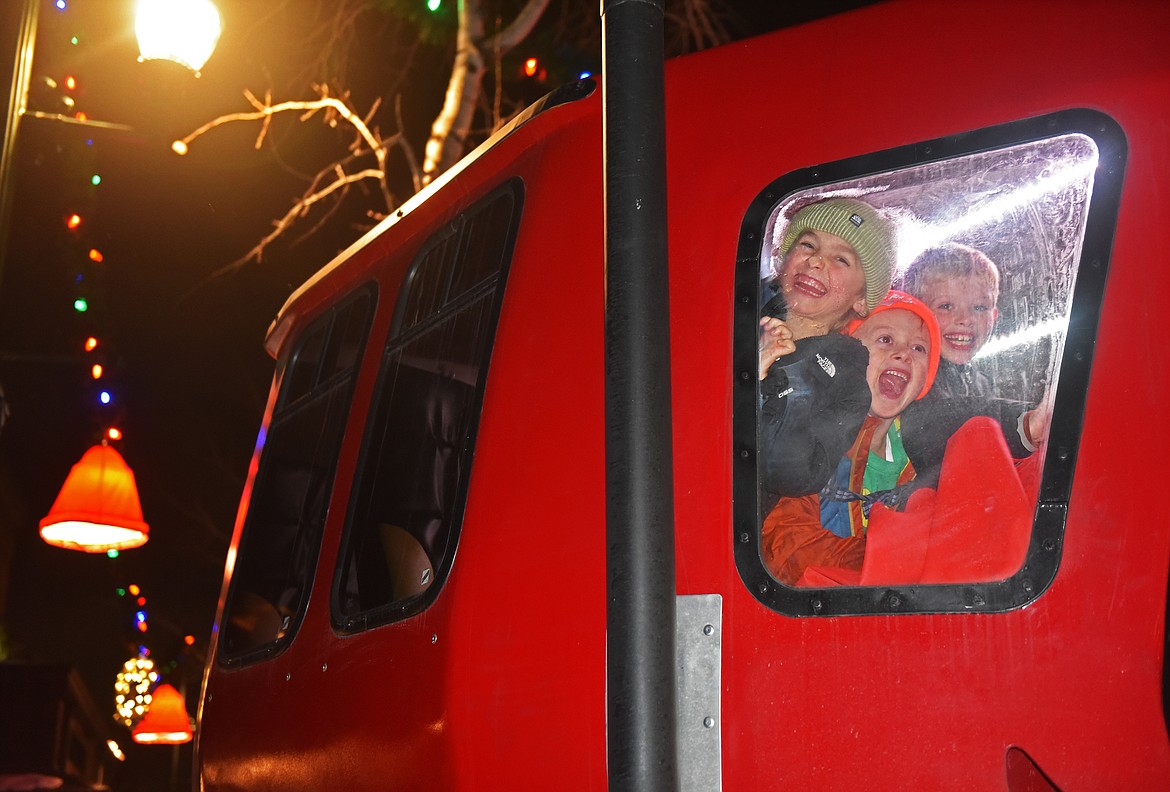 Questionable snowcat operators at the Christmas Stroll. (Kelsey Evans/Whitefish Pilot)