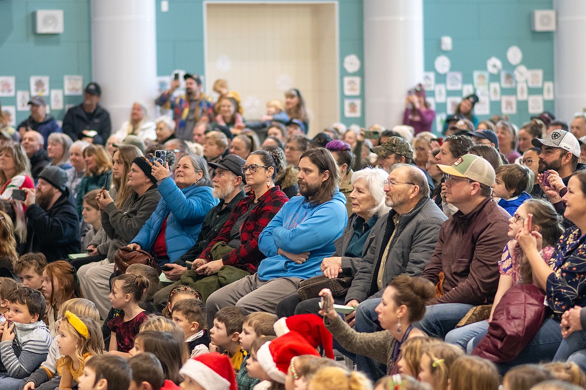 Family members watch the Glacier Gateway Christmas concert last week.