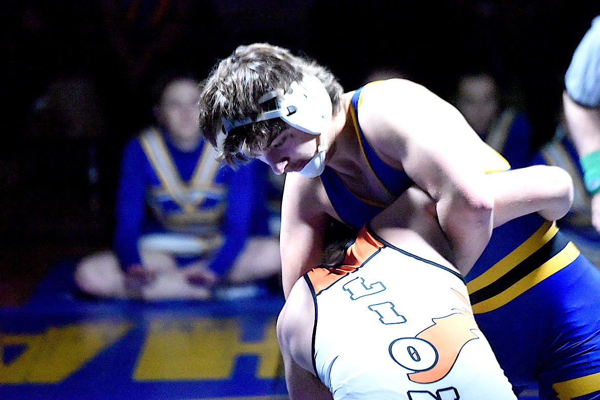 Libby wrestler Ian Thom has Eureka's Richie Heavy Runner under control during their 190-pound match Tuesday, Dec. 18, 2024, at Libby Middle High School. Thom got the pin in 3:06. (Scott Shindledecker/The Western News)