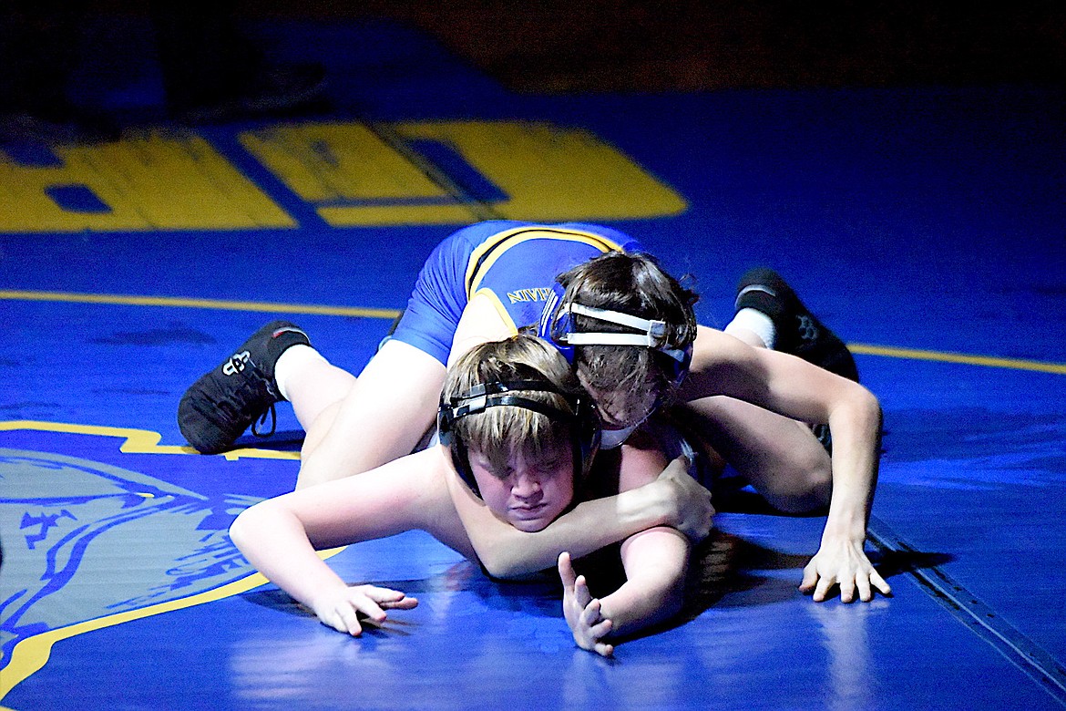 Libby wrestler Tristin Rogers has Eureka's Mason Hickman under control during their 110-pound match Tuesday, Dec. 18, 2024, at Libby Middle High School. Rogers got the pin in 1:16. (Scott Shindledecker/The Western News)