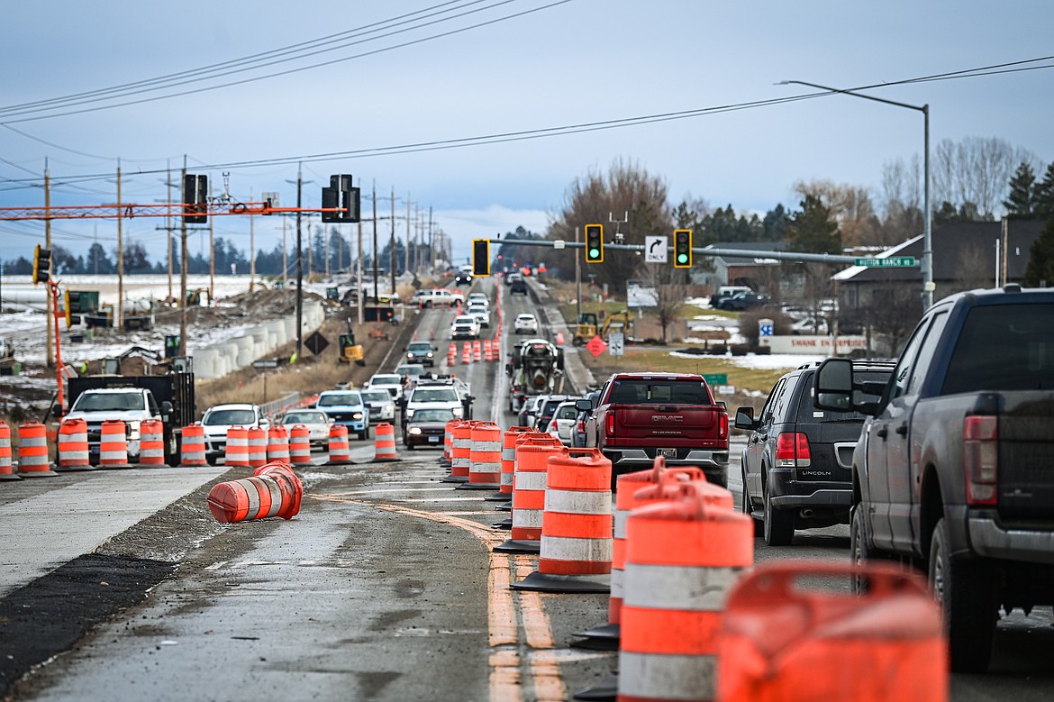 Traffic passes through the West Reserve Drive expansion project in Kalispell on Tuesday, Dec. 17. (Casey Kreider/Daily Inter Lake)