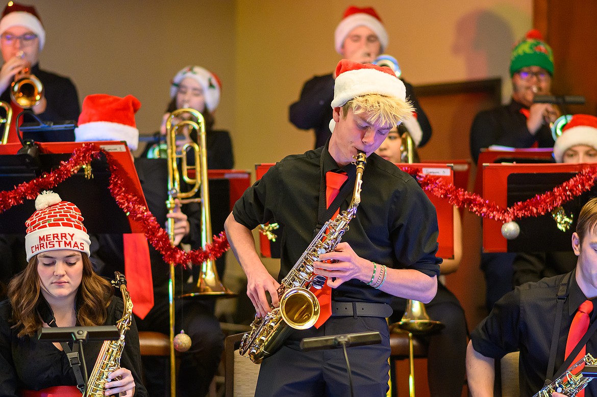 Carson Settles with a solo as the Columbians play during the holiday Jazz Cafe Sunday night at Cedar Creek Lodge.