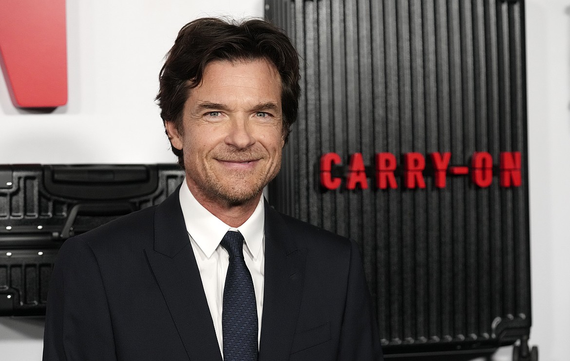 Jason Bateman, a cast member in "Carry-On," poses at the premiere of the film Dec. 5, 2024, at the Egyptian Theatre Hollywood in Los Angeles.