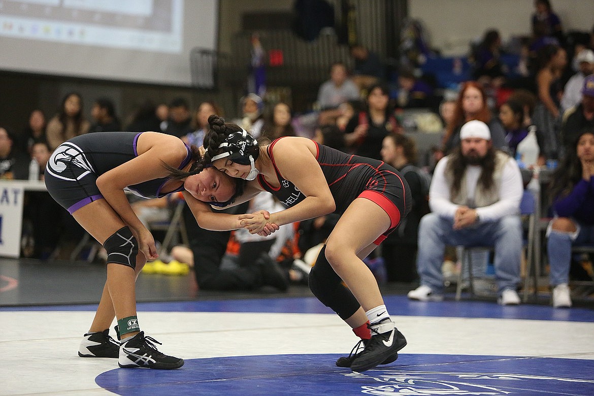 Othello junior Briseida Galvez, right, wrestles at a tournament in Warden last season. Galvez was one of 10 Huskies that placed at Saturday’s Kennewick Lioness Invitational.