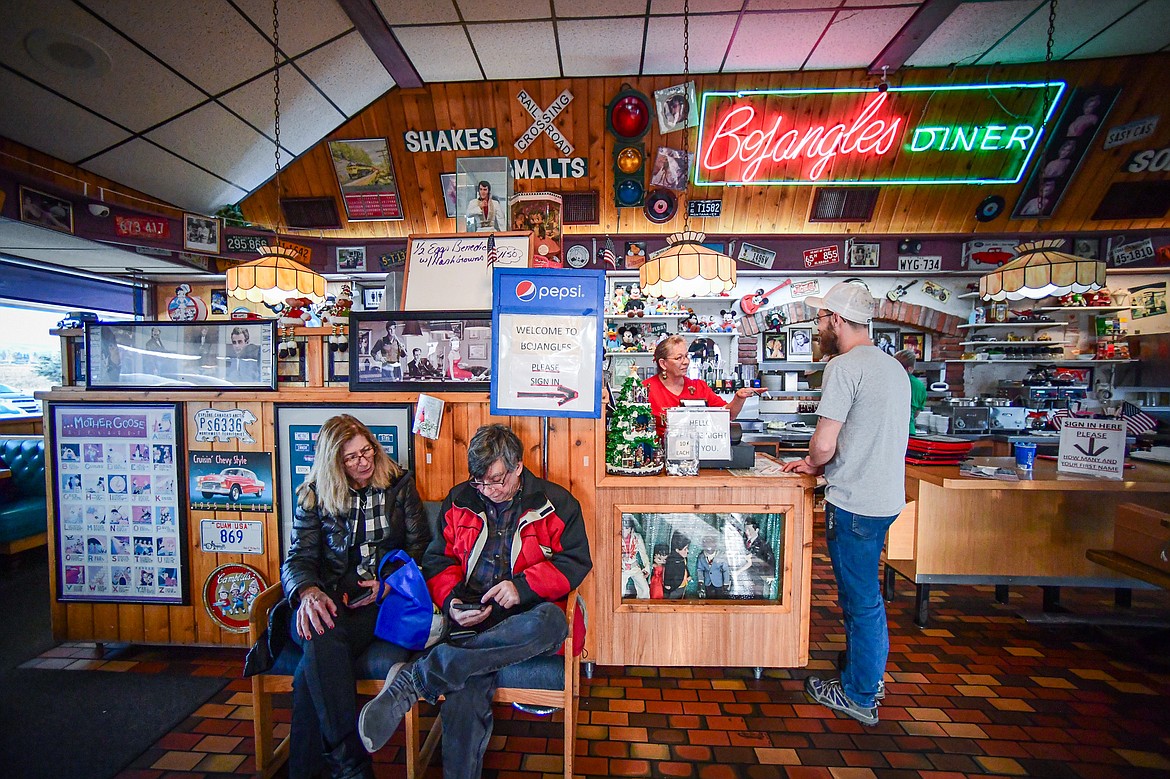 Owner Tena Bowen rings up a customer after a meal at Bojangles Diner in Kalispell on Thursday, Dec. 19. (Casey Kreider/Daily Inter Lake)