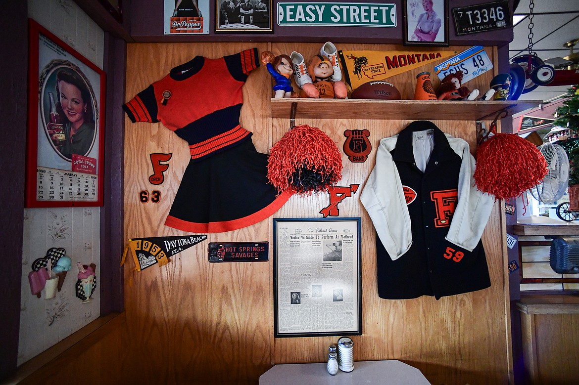 Memorabilia hangs on a wall above a table at Bojangles Diner in Kalispell on Thursday, Dec. 19. (Casey Kreider/Daily Inter Lake)