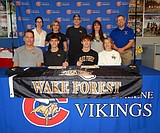 Signing photos Dec. 24, 2024