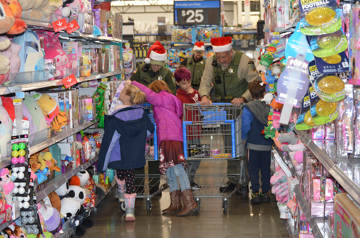 There's nothing that Deputy Mike Groves enjoys more than shopping for toys.