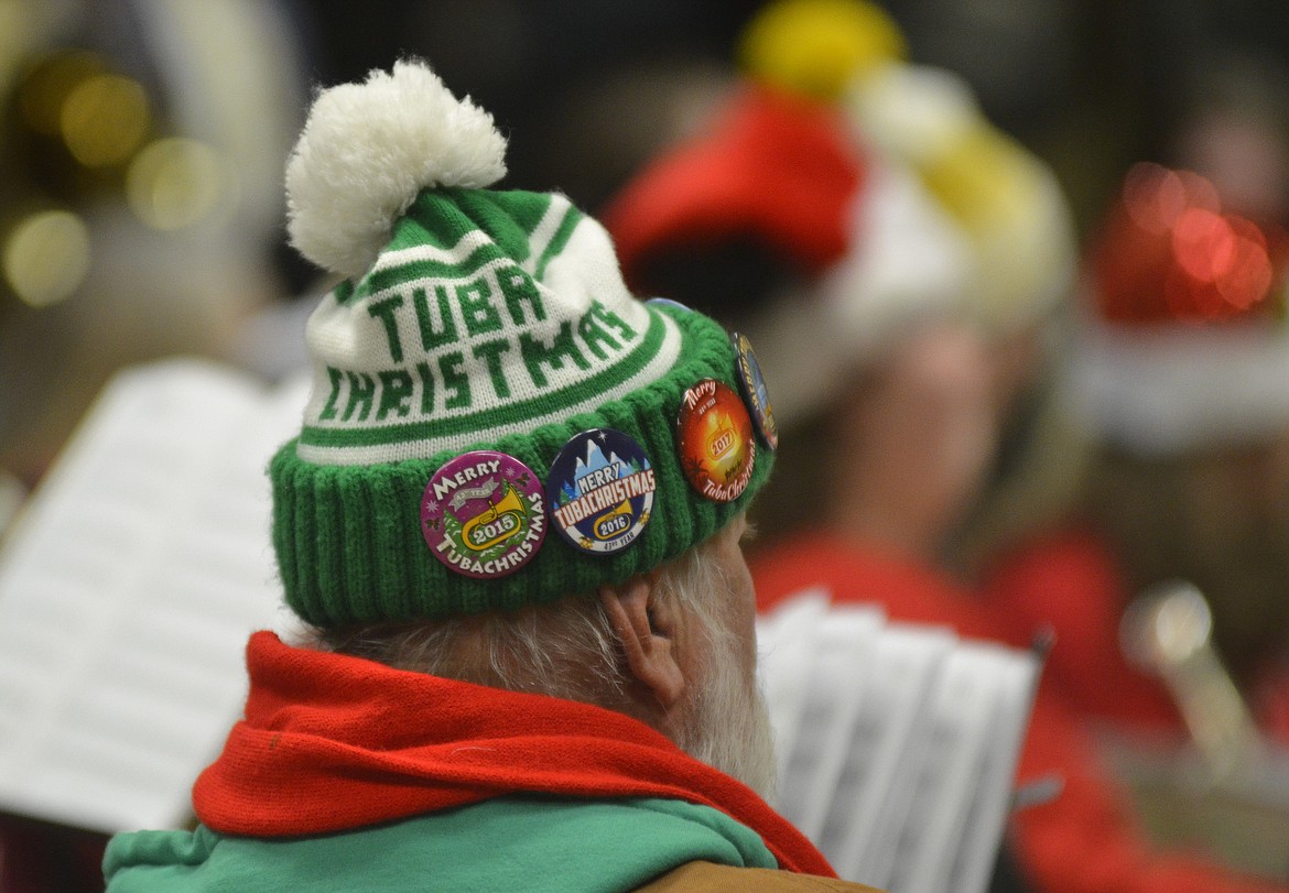 Ahti Mohala wears a TubaChristmas hat with decorative buttons during the TubaChristmas concert Dec. 16 at the Red Lion Hotel in Kalispell. (Heidi Desch/Daily Inter Lake)