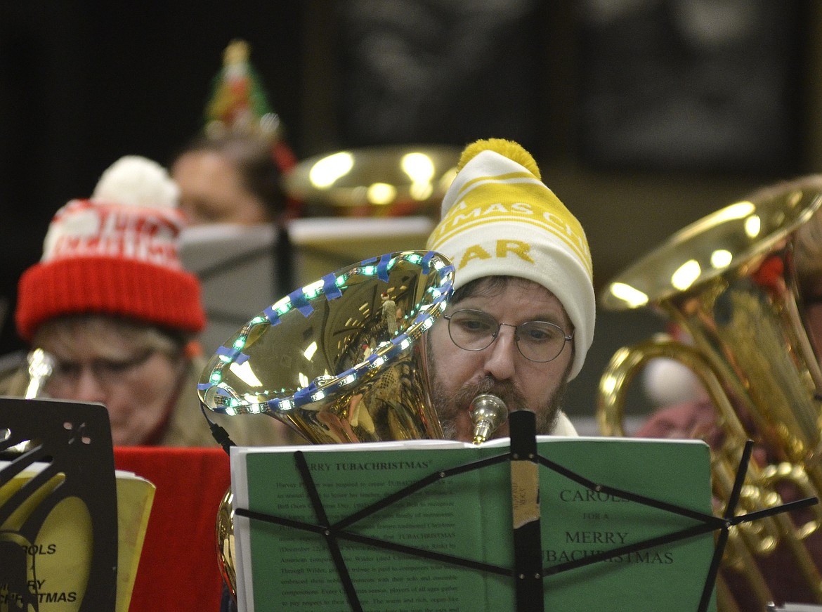 A musician plays during the TubaChristmas concert on Dec. 16 at the Red Lion Hotel in Kalispell. (Heidi Desch/Daily Inter Lake)