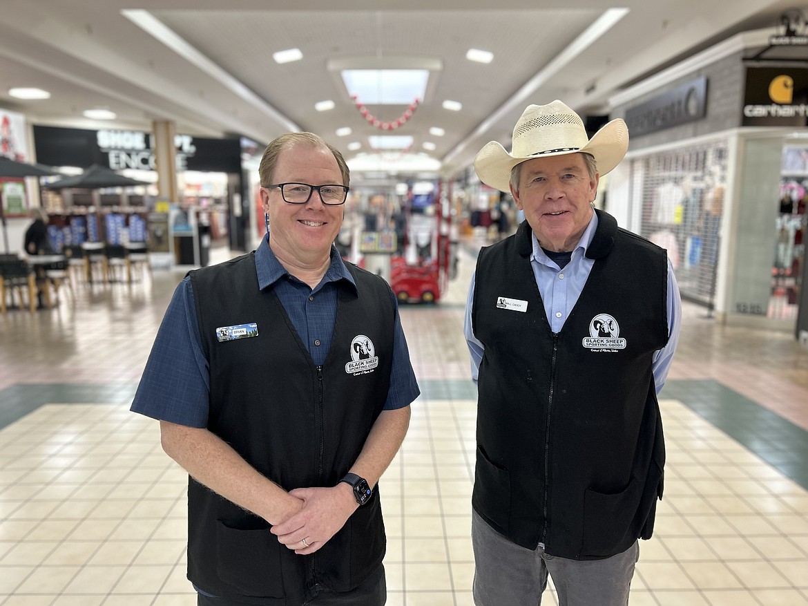 Dave Knoll, right, and Brian Knoll stand at the Silver Lake Mall.