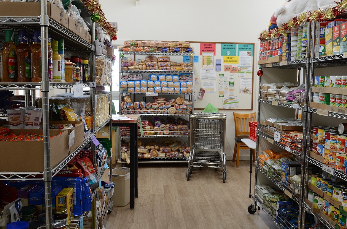 Pre-Christmas bounty at Polson's Loaves and Fish, where families in need were able to restock their cupboards before Christmas. (Kristi Niemeyer/Leader)