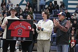 The Guardian returns home ... Manzardo, family celebrated during halftime of Lake City boys basketball game