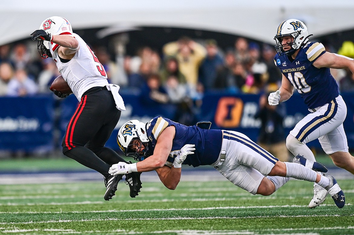 Montana State linebacker McCade O'Reilly (43) tackles South Dakota running back Travis Theis (5) on a run in the second half during an FCS semifinal game at Bobcat Stadium on Saturday, Dec. 21. (Casey Kreider/Daily Inter Lake)