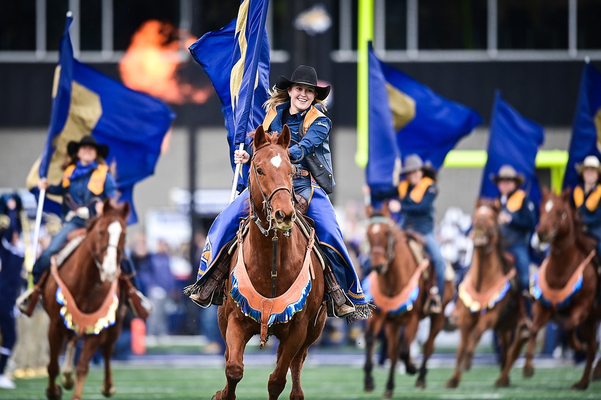 Horseback riders enter the field during the Montana State Runout before an FCS semifinal game against South Dakota at Bobcat Stadium on Saturday, Dec. 21. (Casey Kreider/Daily Inter Lake)