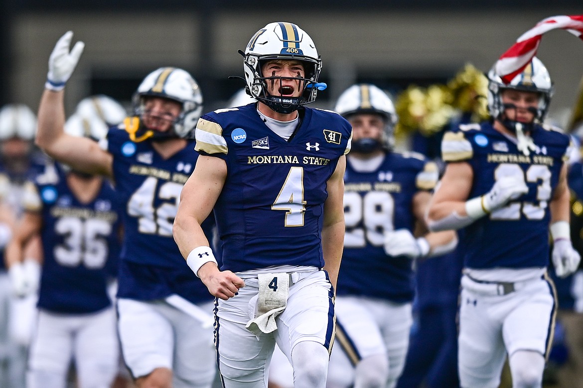 Montana State and quarterback Tommy Mellott (4) take the field before an FCS semifinal game against South Dakota at Bobcat Stadium on Saturday, Dec. 21. (Casey Kreider/Daily Inter Lake)