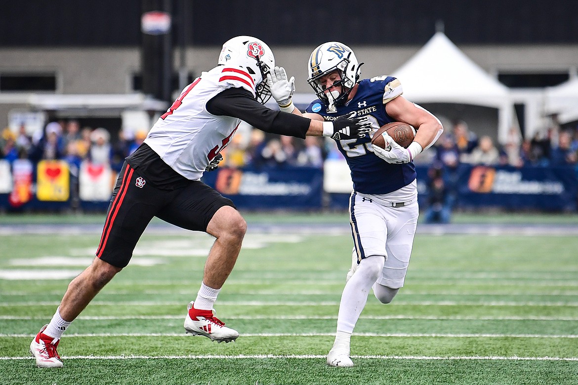 Montana State running back Adam Jones (23) picks up yardage on a run in the second quarter during an FCS semifinal game against South Dakota at Bobcat Stadium on Saturday, Dec. 21. (Casey Kreider/Daily Inter Lake)